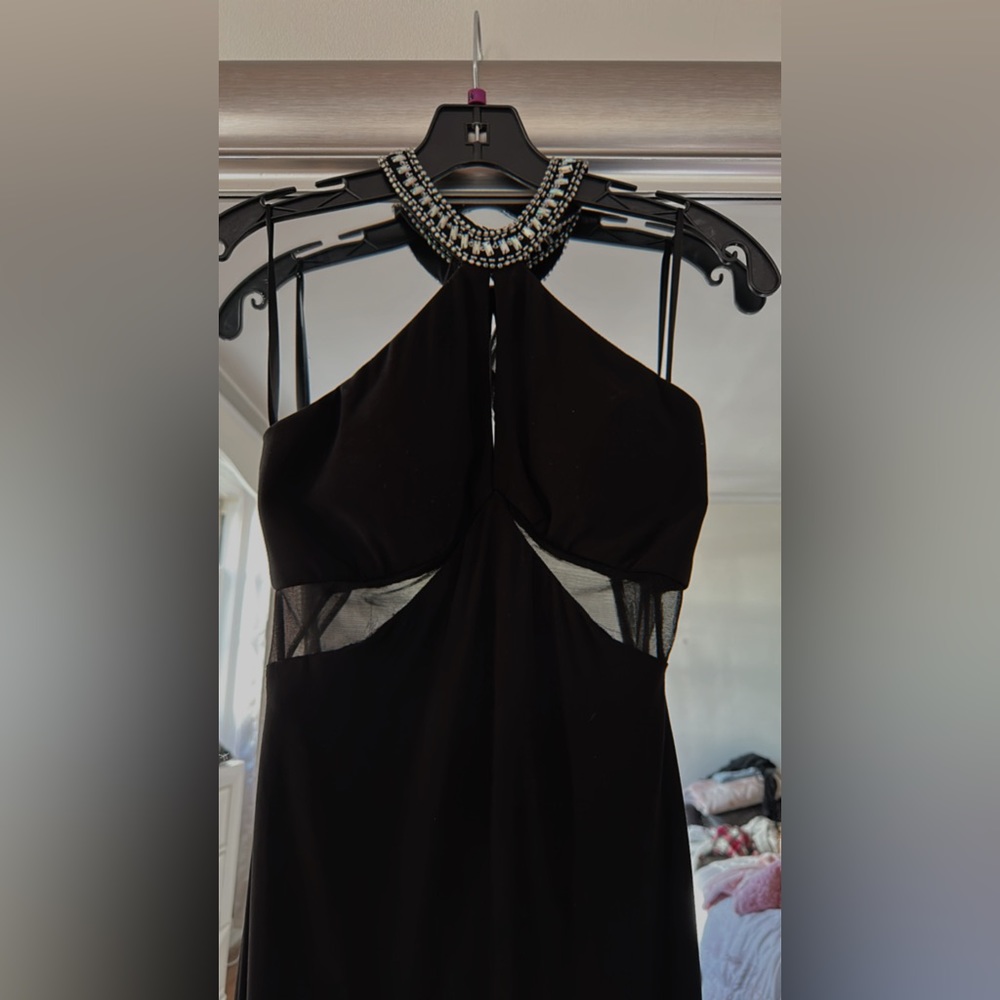 Black prom dress with a slit in the left side